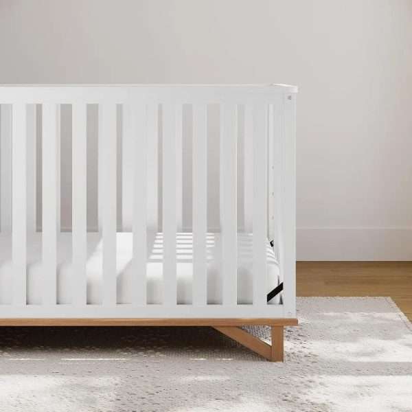 Storkcraft-Santa-Monica-5-in-1-Convertible-Crib-White-with-Vintage-Driftwood-GREENGUARD-Gold-Certified-Modern_c4fd46f5-119b-45cf-9f78-f89fa5b0600e.jpg Modern Design 5-in-1 Convertible Crib (White with Vintage Driftwood)